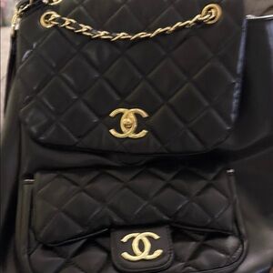 Elegant Black Quilted Backpack with Gold Details